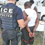 ICE Special Agent arresting a suspect