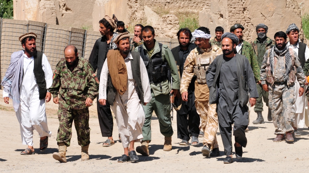 Taliban insurgents turn themselves in to Afghan National Security Forces at a forward operating base in Puza-i-Eshan, 2010. Photo source: ISAF Public Affairs / ResoluteSupportMedia / Flickr, CC BY 2.0