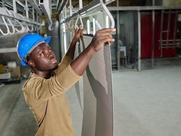 African,Worker,Working,With,Products,In,Workshop