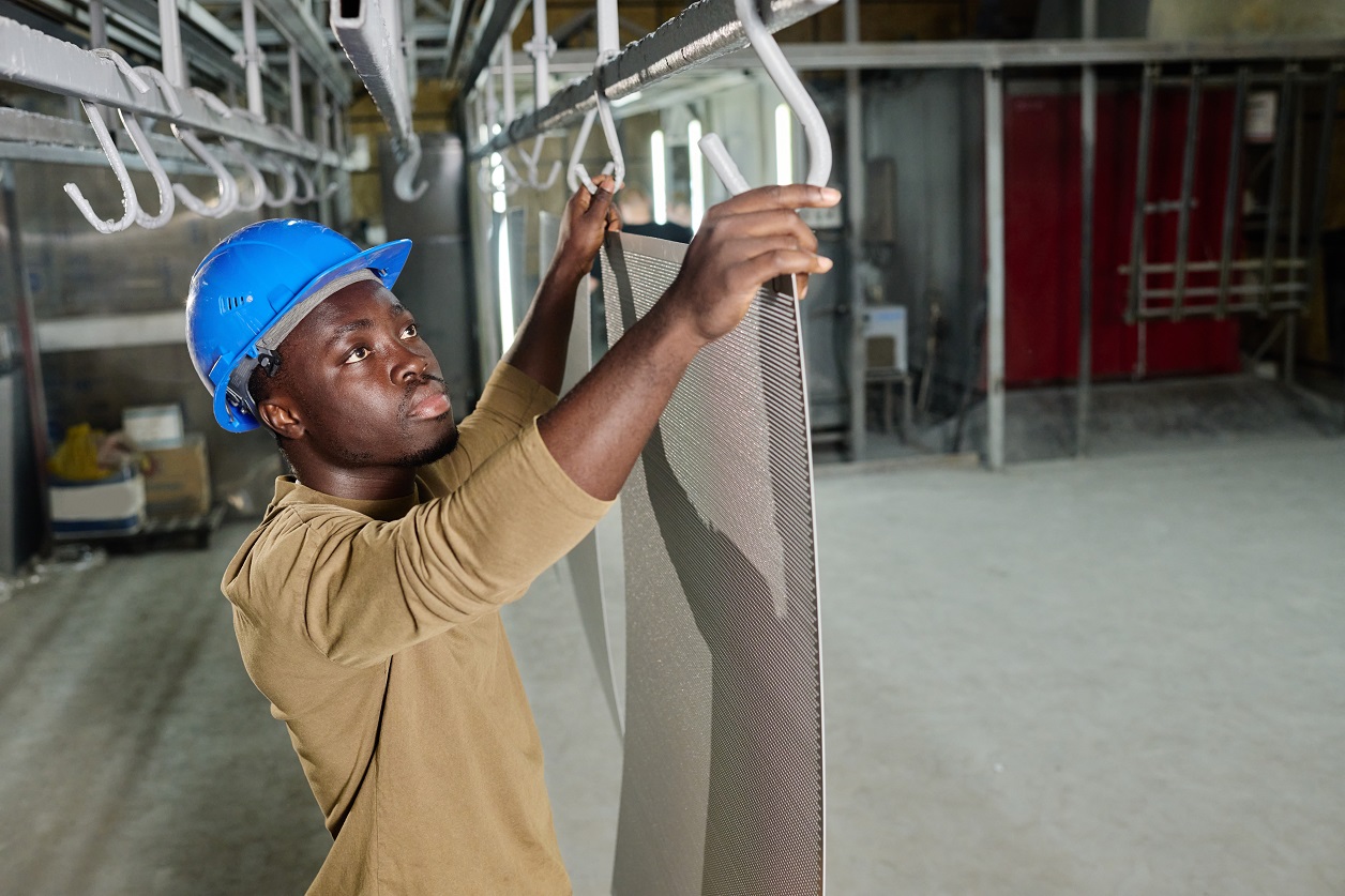 African,Worker,Working,With,Products,In,Workshop