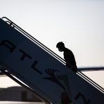 A_Guatemalan_man_boards_a_charter_flight_back_to_his_country_from_Texas_on_United_States_Immigration_and_Customs_Enforcement_
