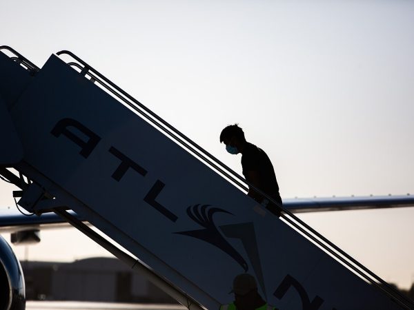 A_Guatemalan_man_boards_a_charter_flight_back_to_his_country_from_Texas_on_United_States_Immigration_and_Customs_Enforcement_
