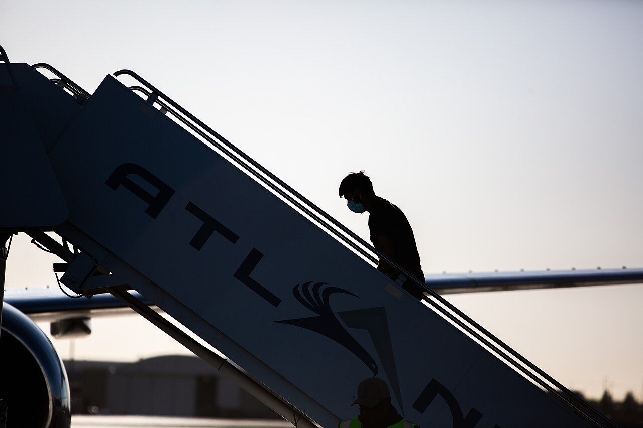A_Guatemalan_man_boards_a_charter_flight_back_to_his_country_from_Texas_on_United_States_Immigration_and_Customs_Enforcement_