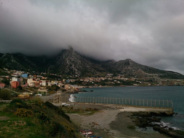 View of Ceuta and the border fence with Morocco. Photo source: Adobe Stock.