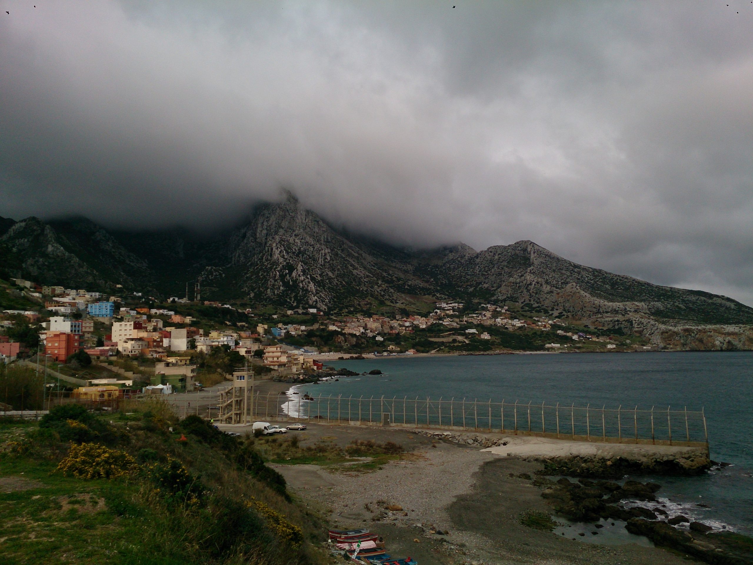 View of Ceuta and the border fence with Morocco. Photo source: Adobe Stock.
