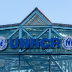 Geneva, Switzerland – November 16, 2024: Sign and logo of the United Nations High Commissioner for Refugees (UNHCR), a UN agency dedicated to protecting refugees. Photo source: Adobe Stock