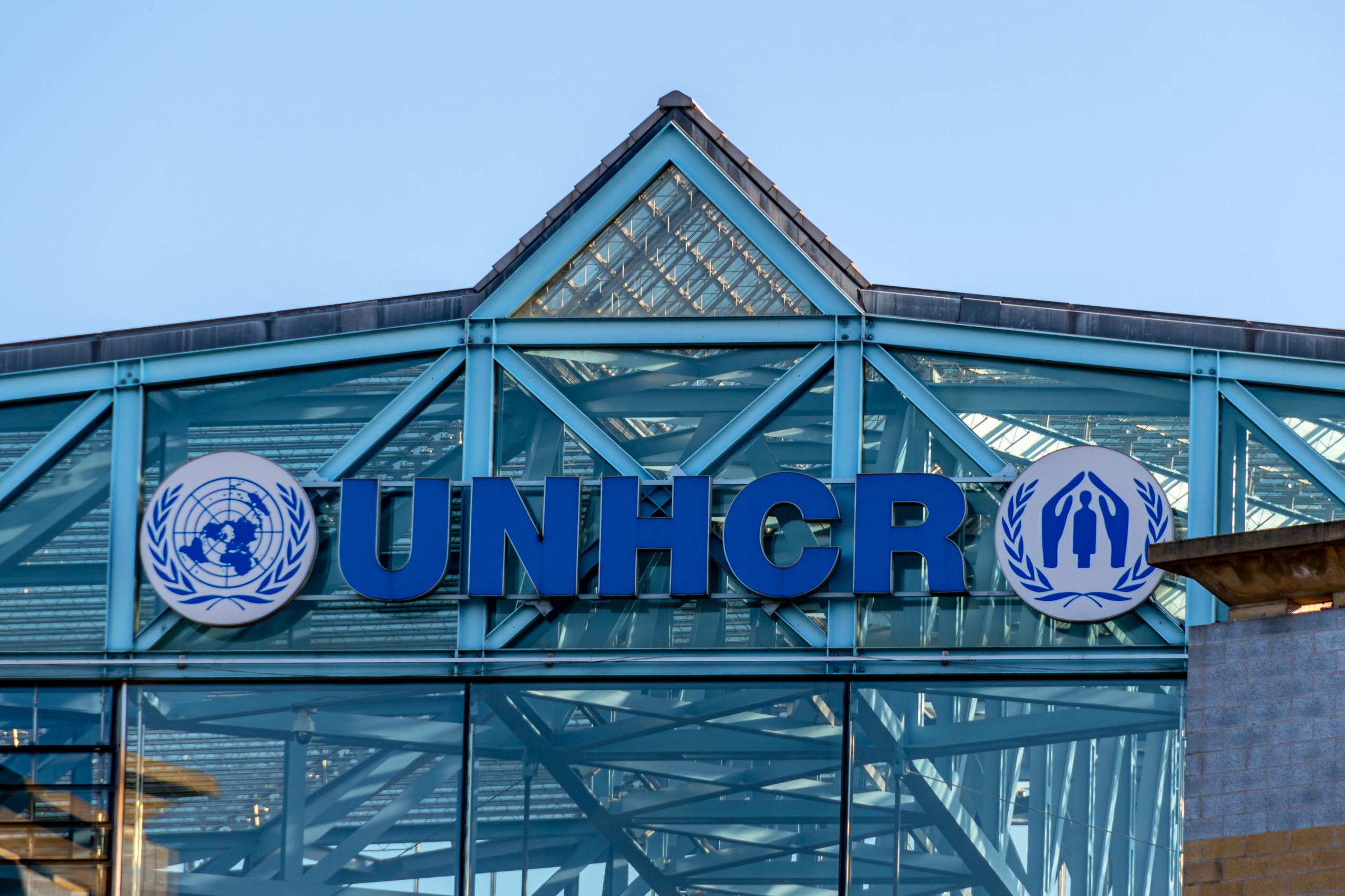 Geneva, Switzerland – November 16, 2024: Sign and logo of the United Nations High Commissioner for Refugees (UNHCR), a UN agency dedicated to protecting refugees. Photo source: Adobe Stock
