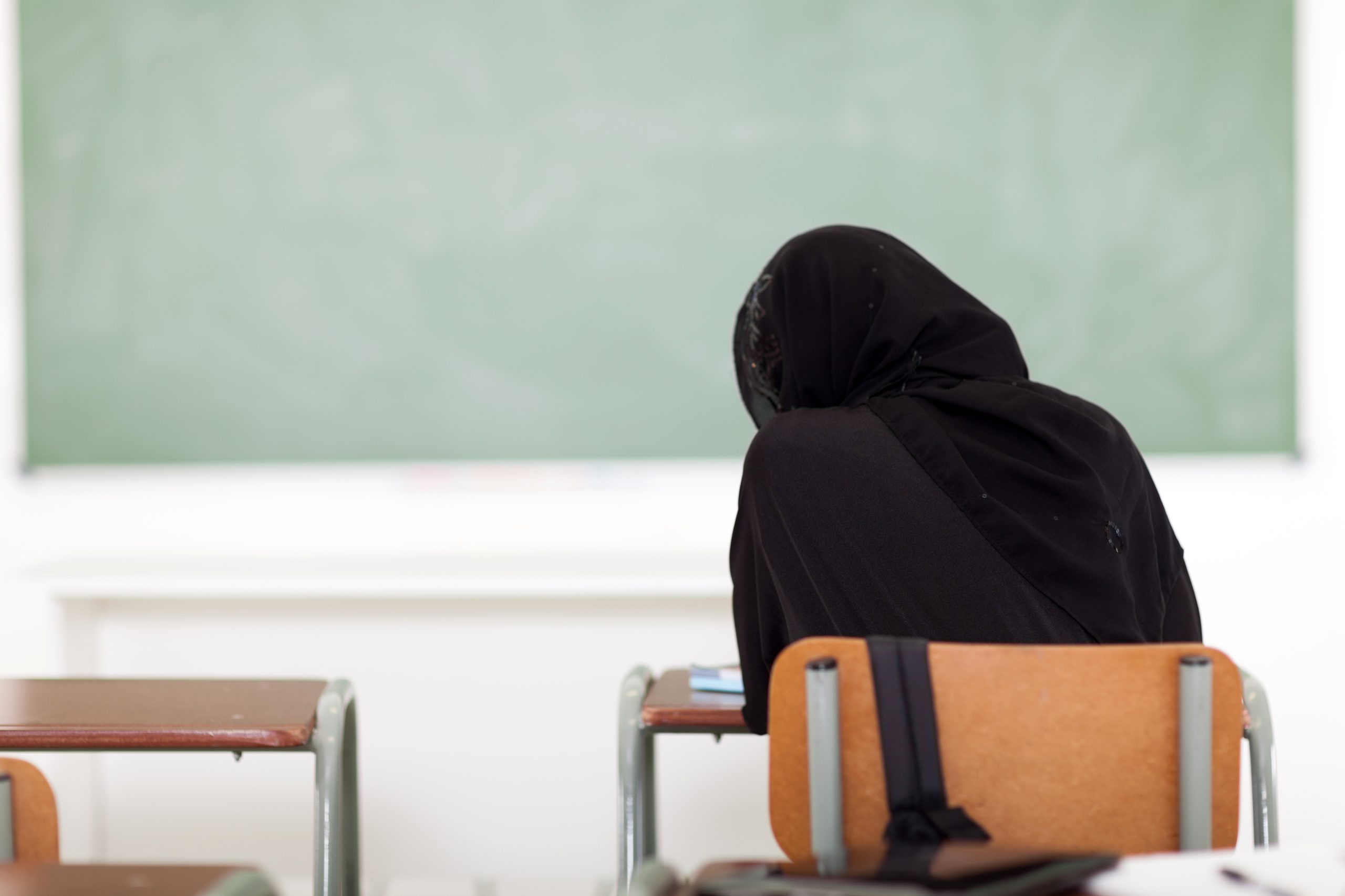 Arabian school girl in classroom. Source: michaeljung / AdobeStock.