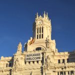 Spanish Parliament Building with Refugees Welcome banner, 2018. Photo source: Katya Belka / Shutterstock.