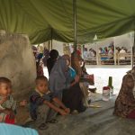 Somali families wait for treatment at the AMISOM Outpatients Department. Somali families wait for treatment at the AMISOM OUtpatients Department