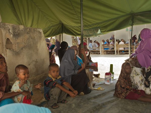Somali families wait for treatment at the AMISOM Outpatients Department. Somali families wait for treatment at the AMISOM OUtpatients Department